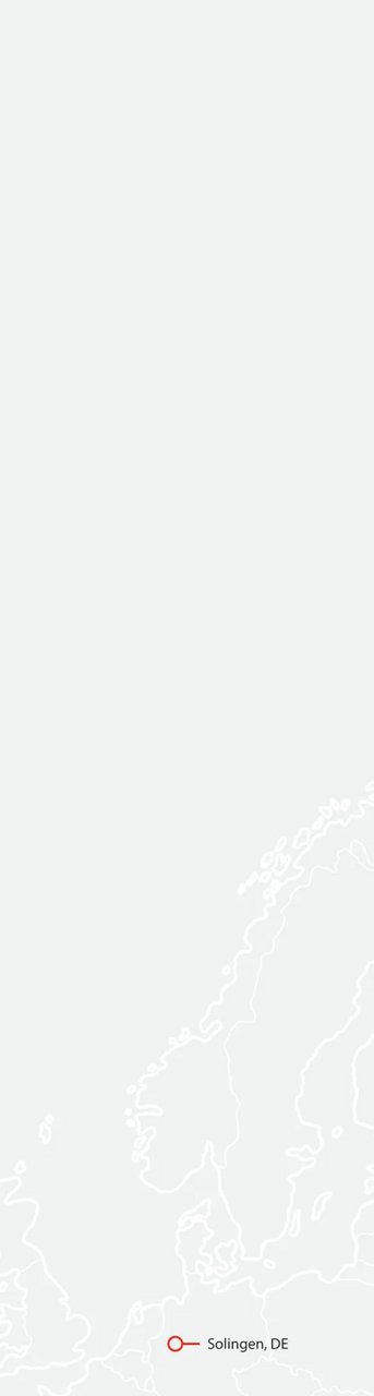 Gray background color with an outline map of Europe, highlighting Solingen, DE - where Wusthof knives are crafted.