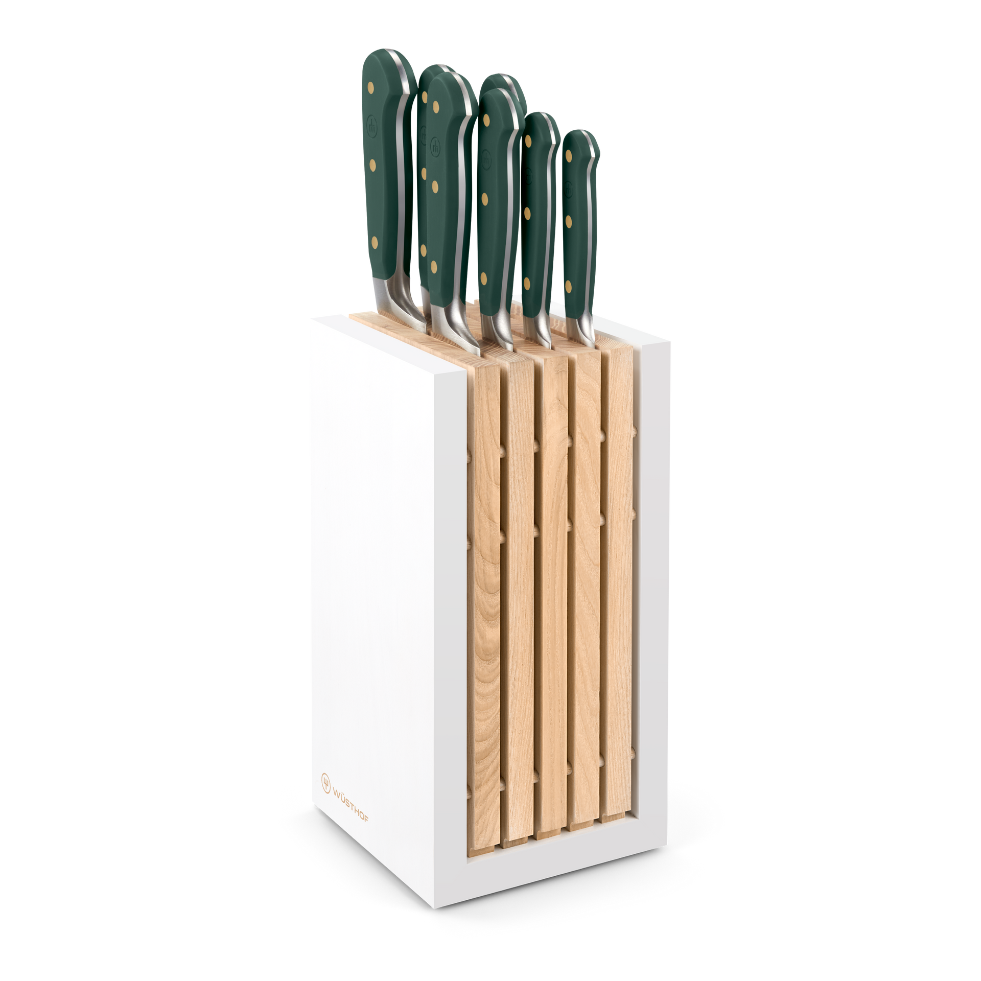 Set of knives with green handles in a wooden block on a white background